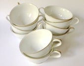 10 noritake china cups, gold rimmed.