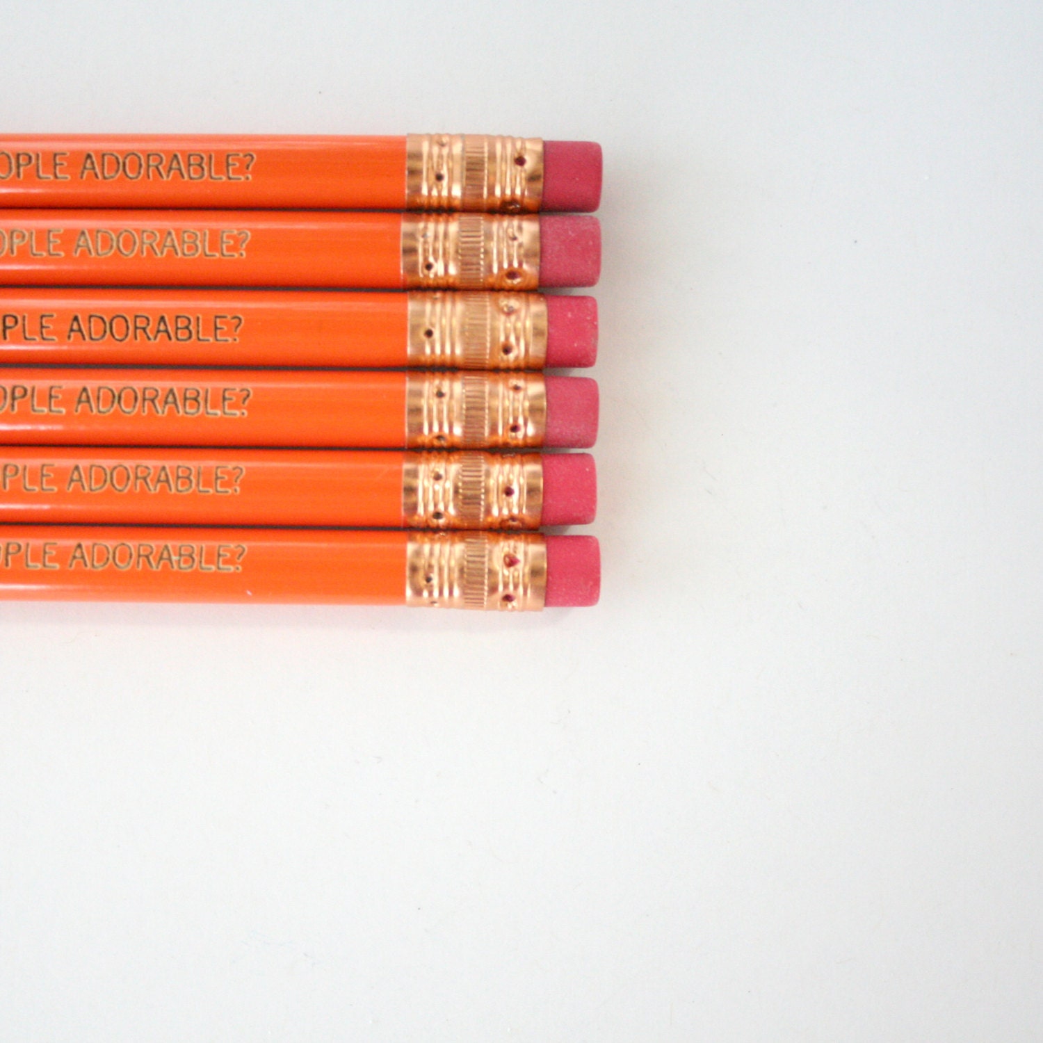aren't ordinary people adorable 6 engraved orange pencils. for when you want a commoner for your housepet.