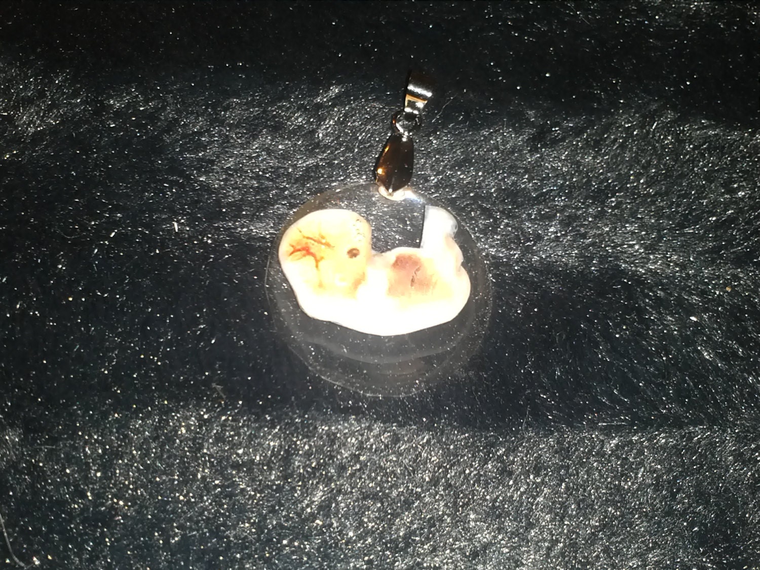 Human embryo pendant