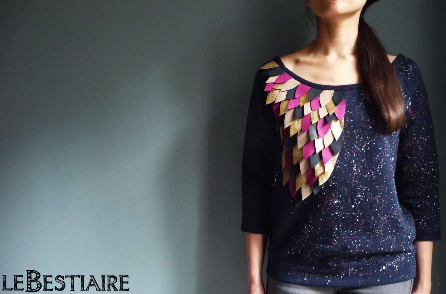 Navy flecked cotton sweat shirt embroidered with leather feathers