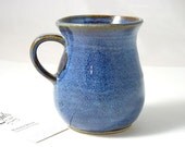 Medium Pot Bellied mug in textured blue glaze breaking brown