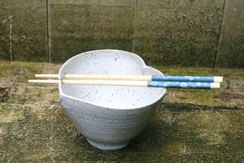 Heart shaped chopstick bowl, white speckles, rustic minimal kitchen.