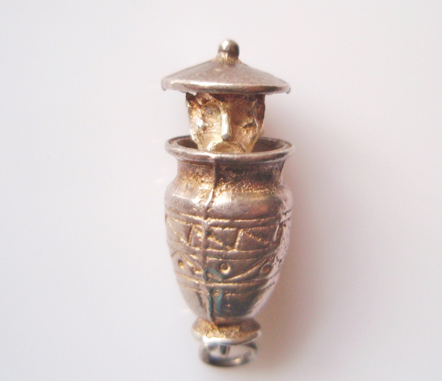 Man in a Barrel Moving Silver Charm