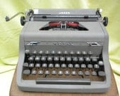 Royal Arrow typewriter, vintage charcoal gray portable mid century manual typewriter