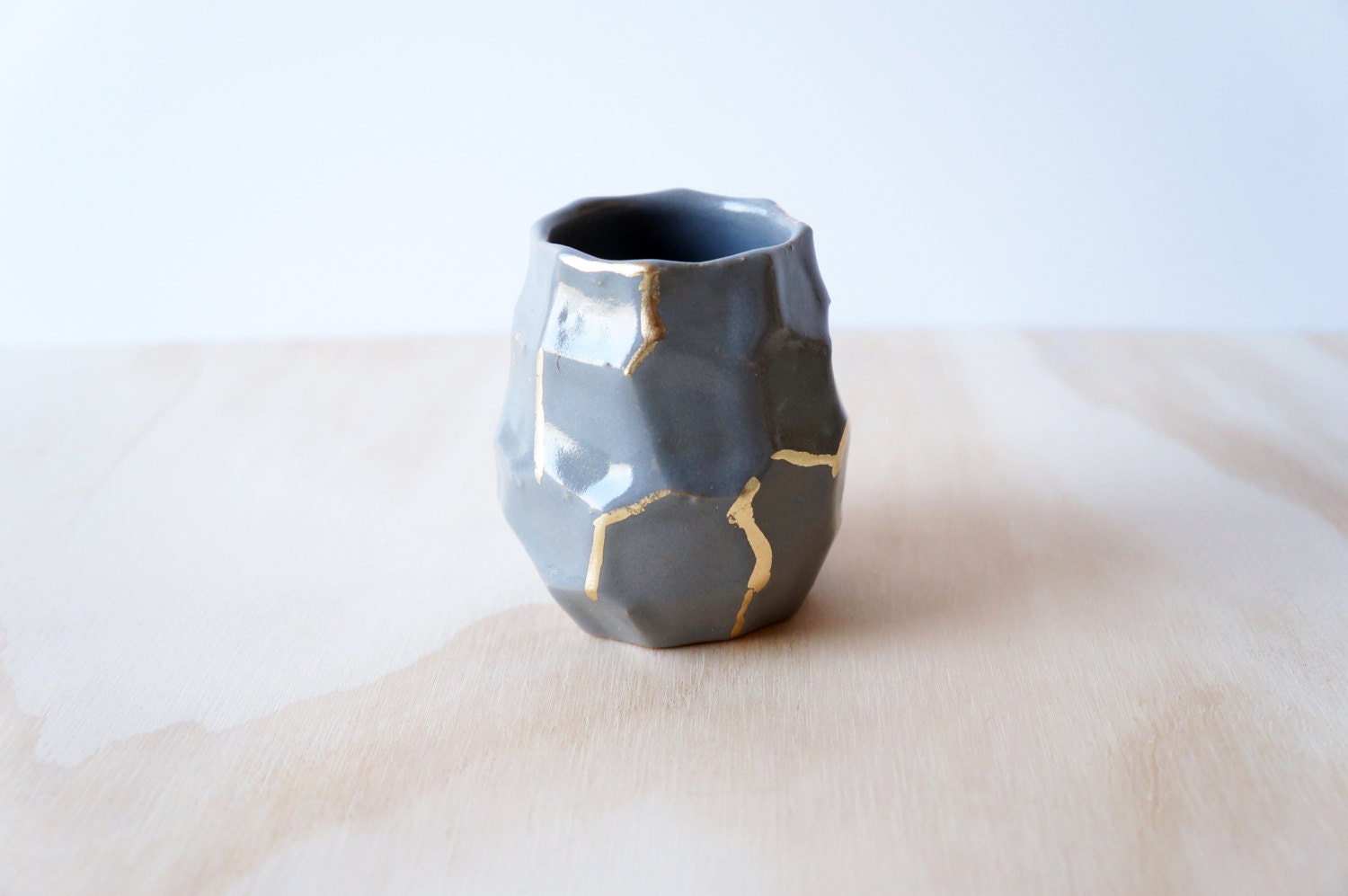 grey and gold faceted bud vase or vessel - theobjectenthusiast