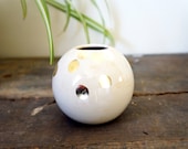 cream and gold leaf ball vase or vessel