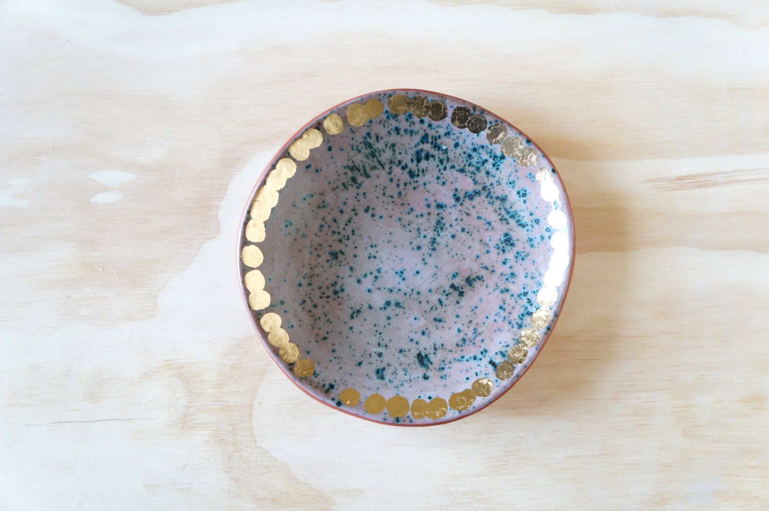8 1/2 inch turquoise speckled plate with gold accents