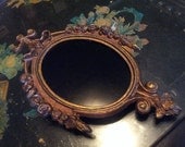 Scrying mirror in antique metal Italian frame