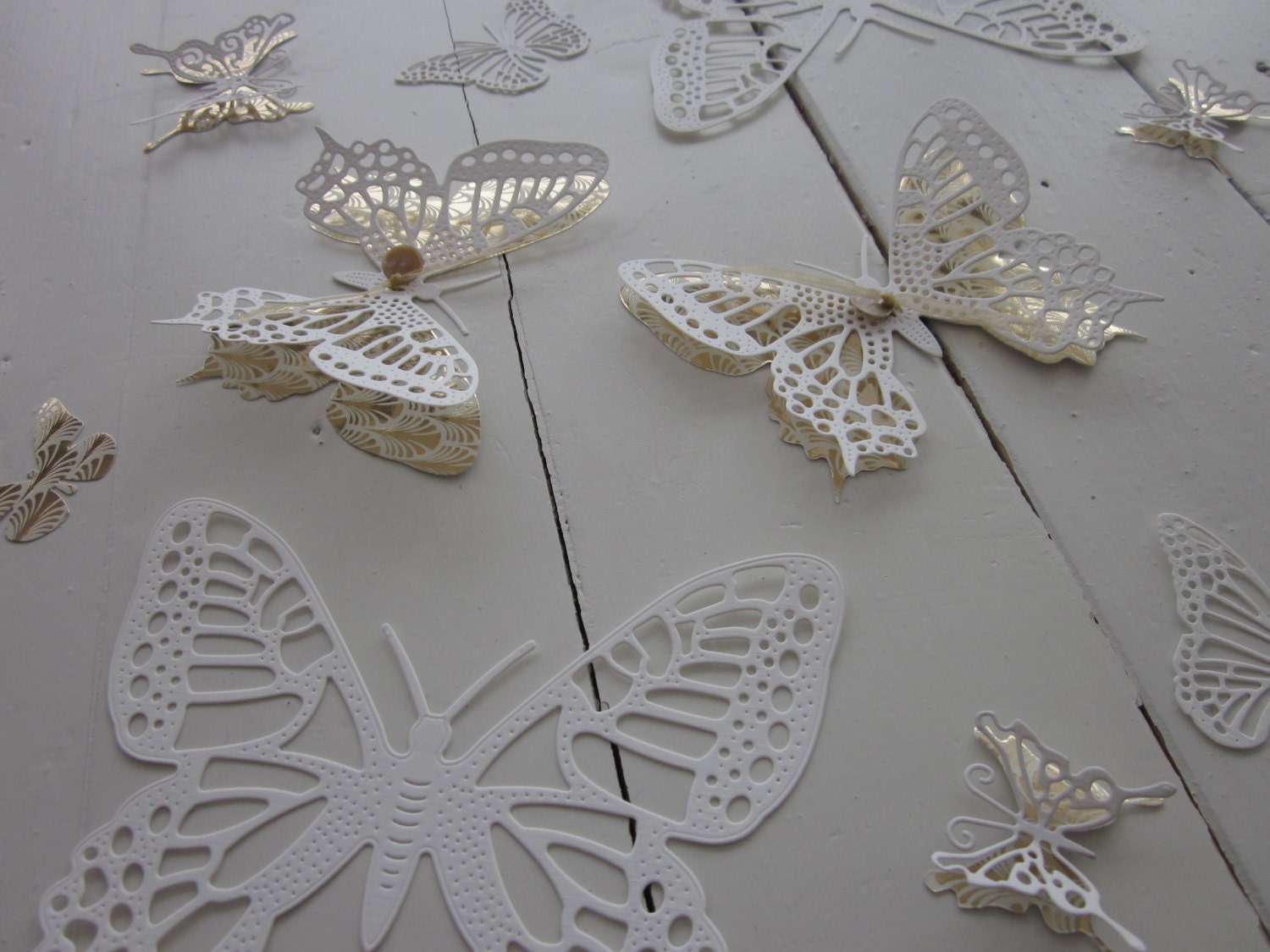 3D paper butterfly wall art in ivory with matching art deco design paper --- Let them fly around on your wall or make a sunburst