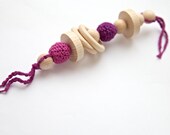 Purple and pink big teething rattle for baby. Natural wooden toy with organic cotton. Ready to ship.