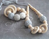 Set of 2. Natural nursing rings necklace and teething ring toy.