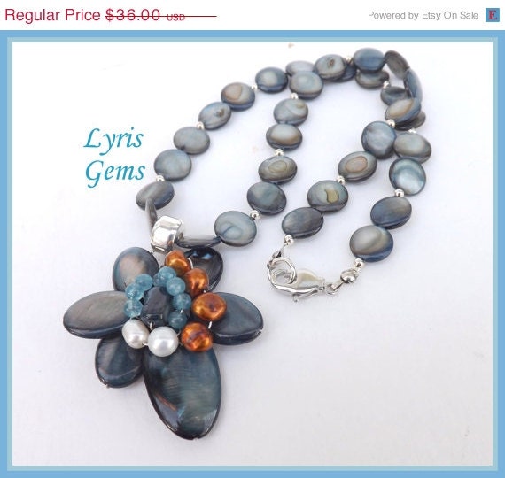 ON SALE Blue Mother of Pearl Necklace, Flower Focal Pendant, Wire Wrapped, handmade by Lyrisgems