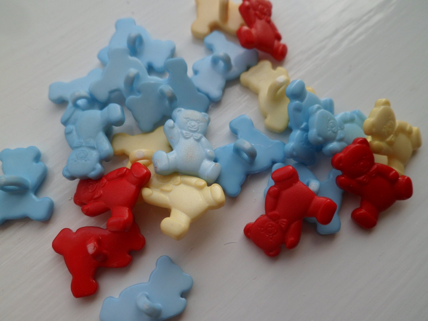 24 Retro Teddy Bear Buttons in red, Blue and Yellow.