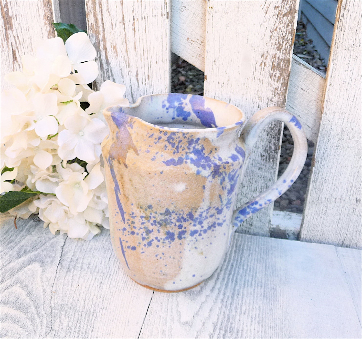 White and Blue Stoneware Pottery Pitcher
