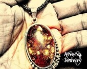 Baltic Amber Pendant , Sterling Silver and Braided Leather Chord