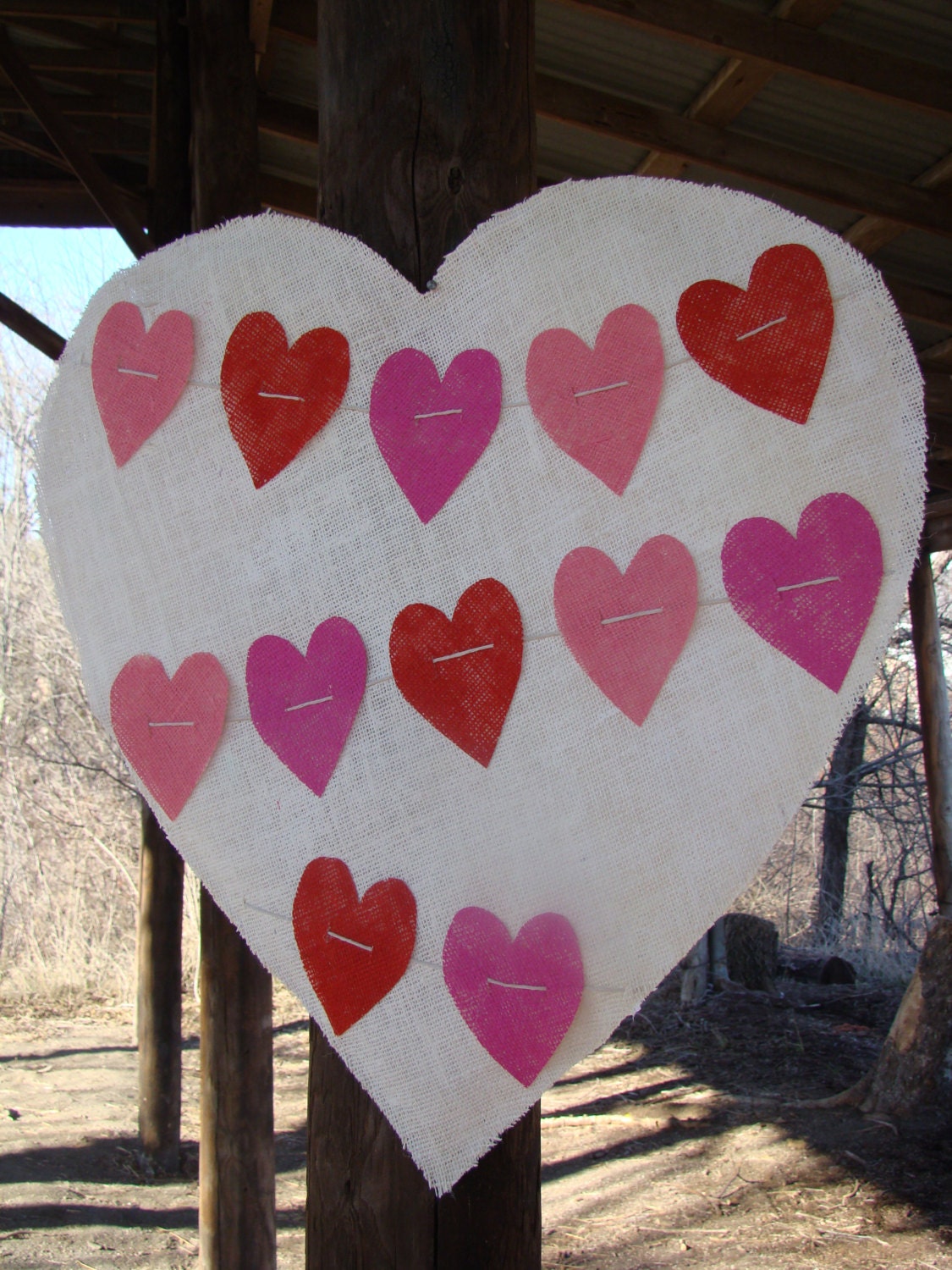 You have my heart on a string.....pink, deep pink, red with white background handpainted burlap valentine decoration