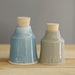 blue salt and pepper bottle pair.  modern pottery bottle with cork