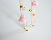 Fish and charms necklace in green