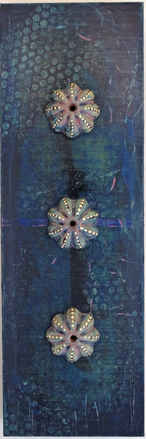 URCHINS   -   A mixed media original painting featuring salvaged metal knob embellishments and watery deep ocean colors on a wood art panel.