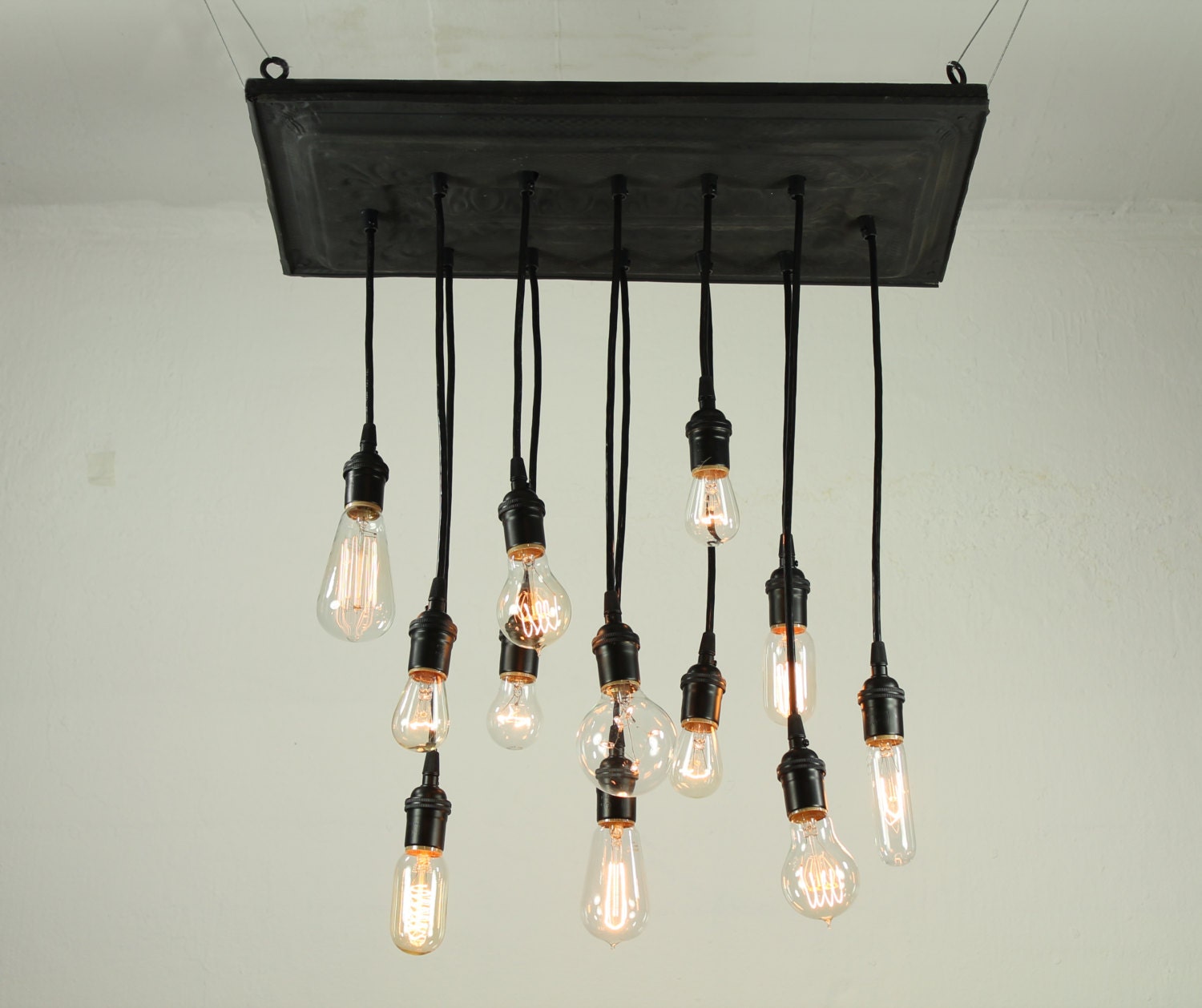 Salvaged barn tin chandy with varying edison-style bulbs