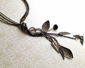 Layered Chain Necklace. Multiple Chains. Long Necklace. Metal Feathers. Angel Wings. Heart Charm. Silver. Gunmetal. Black.  Glass Beads.