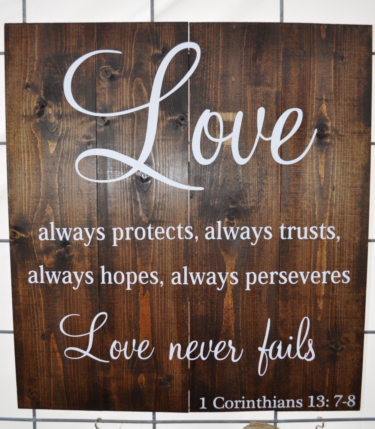 1 Corinthians 13: 7-8 "Love Never Fails" Sign