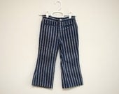 Vintage 1970s child's striped bell bottom jeans