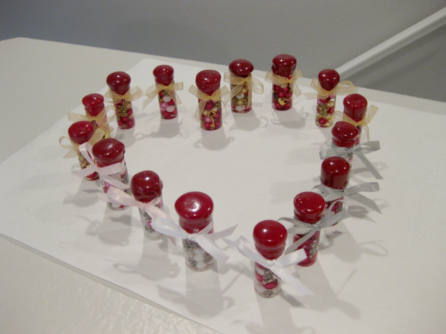 Lot 16 Charm Vials filled w/ Gold Bronze Silver Charms Vibrant Color Pearls Tied Bows -Key, Heart, Locket, Cupid, Flowers- Favor Gift Wish