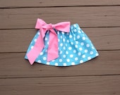 Girls twirly skirt & pink fabric bow. Mod aqua blue polka dot. Custom boutique children's clothing. By EverythingSorella.