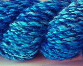 Blue lustre suri alpaca and silk . Hand spun yarn . 2 ply.  Hand processed.