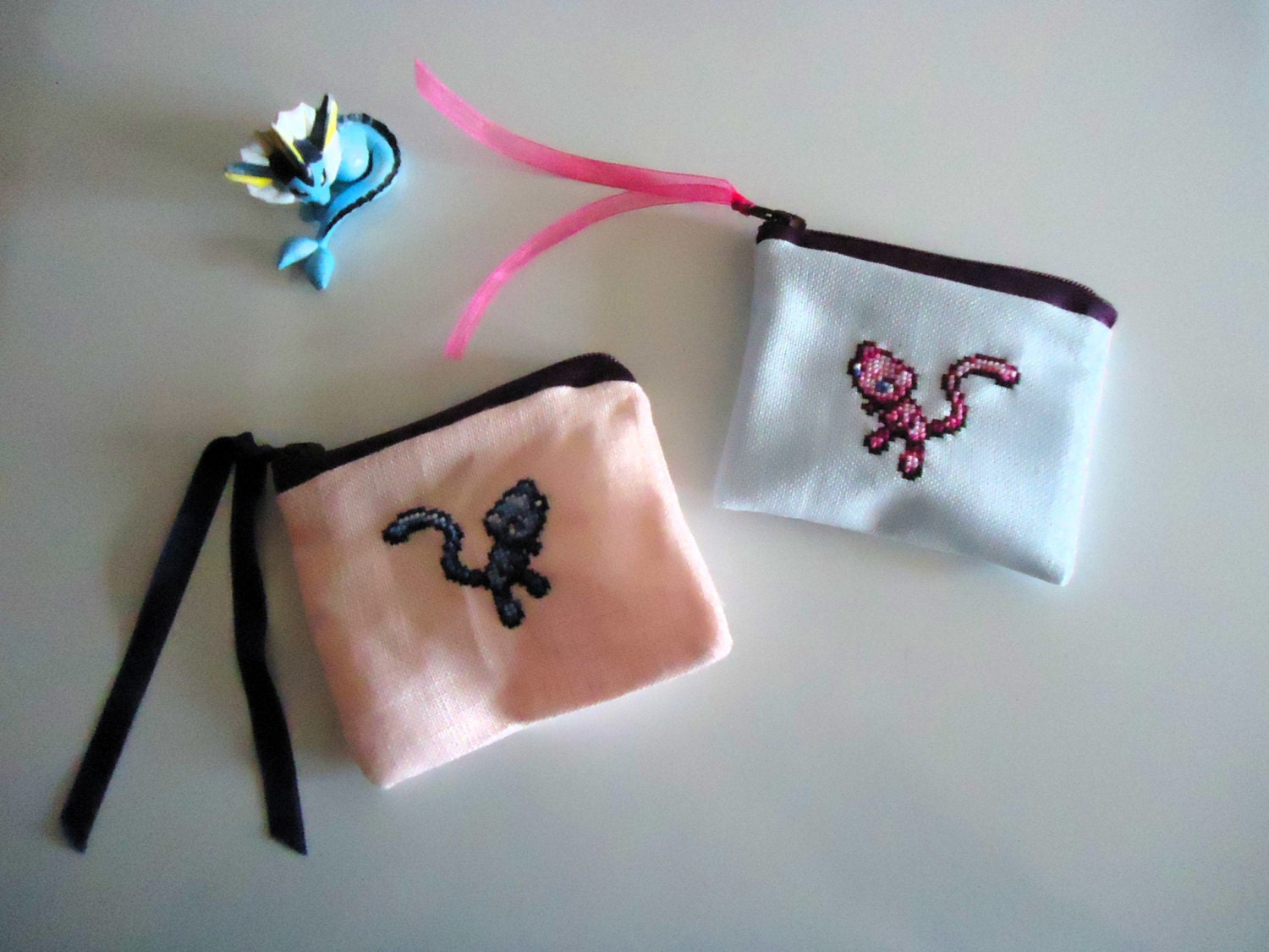 Set of both Mew and shiny Mew cross stitched purses