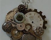 Steampunk Pendant Necklace layered with watch parts, vintage metal buttons, and  key