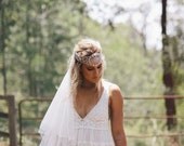 Bohemian vintage style wedding dress with fitted French lace cups and babydoll style panelled skirt