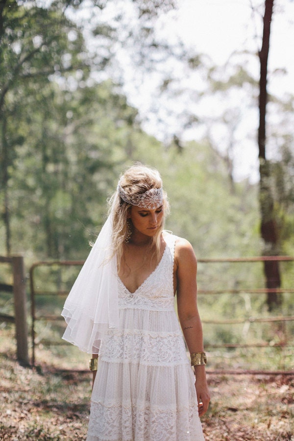 Bohemian vintage style wedding dress with fitted French lace cups and babydoll style panelled skirt