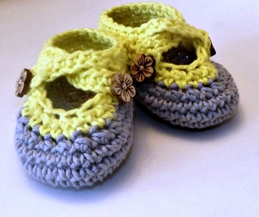 Crochet two strap baby booties, gray and yellow with wood flower buttons