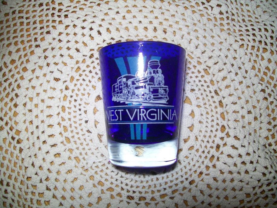 Cobalt blue souvenir shot glass from West Virginia