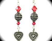 Lovely detailed sterling silver heart earrings with pink Swarovski crystals.