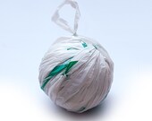 4 Balls Of White And Green Plarn - plastic yarn, 18 meters
