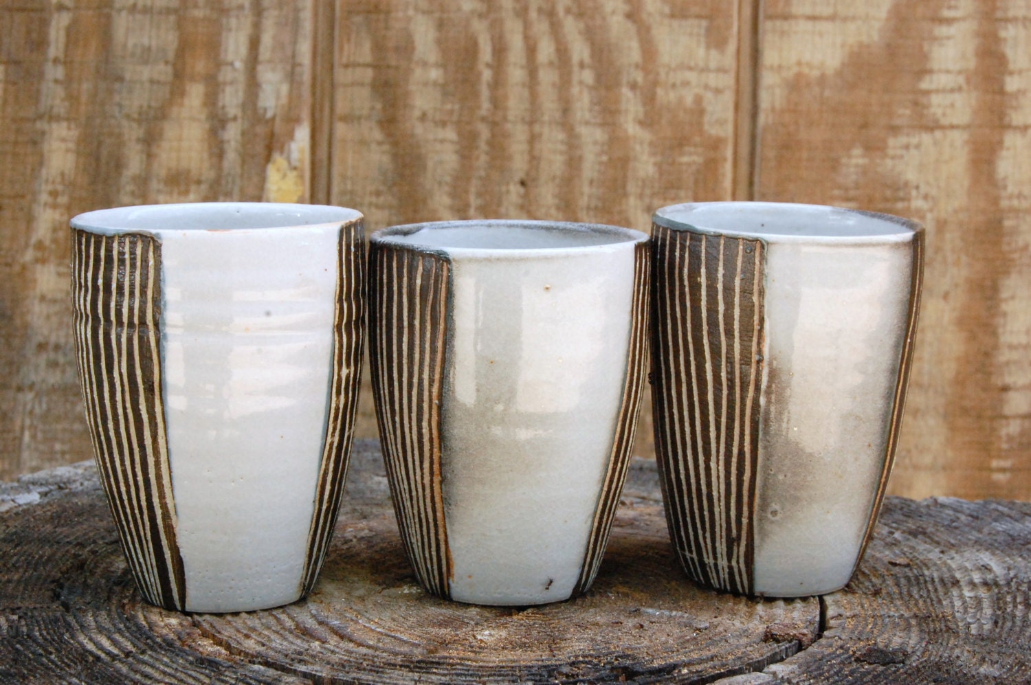 black and white slip-carved tumblers
