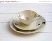 ON SALE Vintage Circa 1950s Tea Cup and Saucer Trio Set Abstract Gold Flower on Cream Porcelain