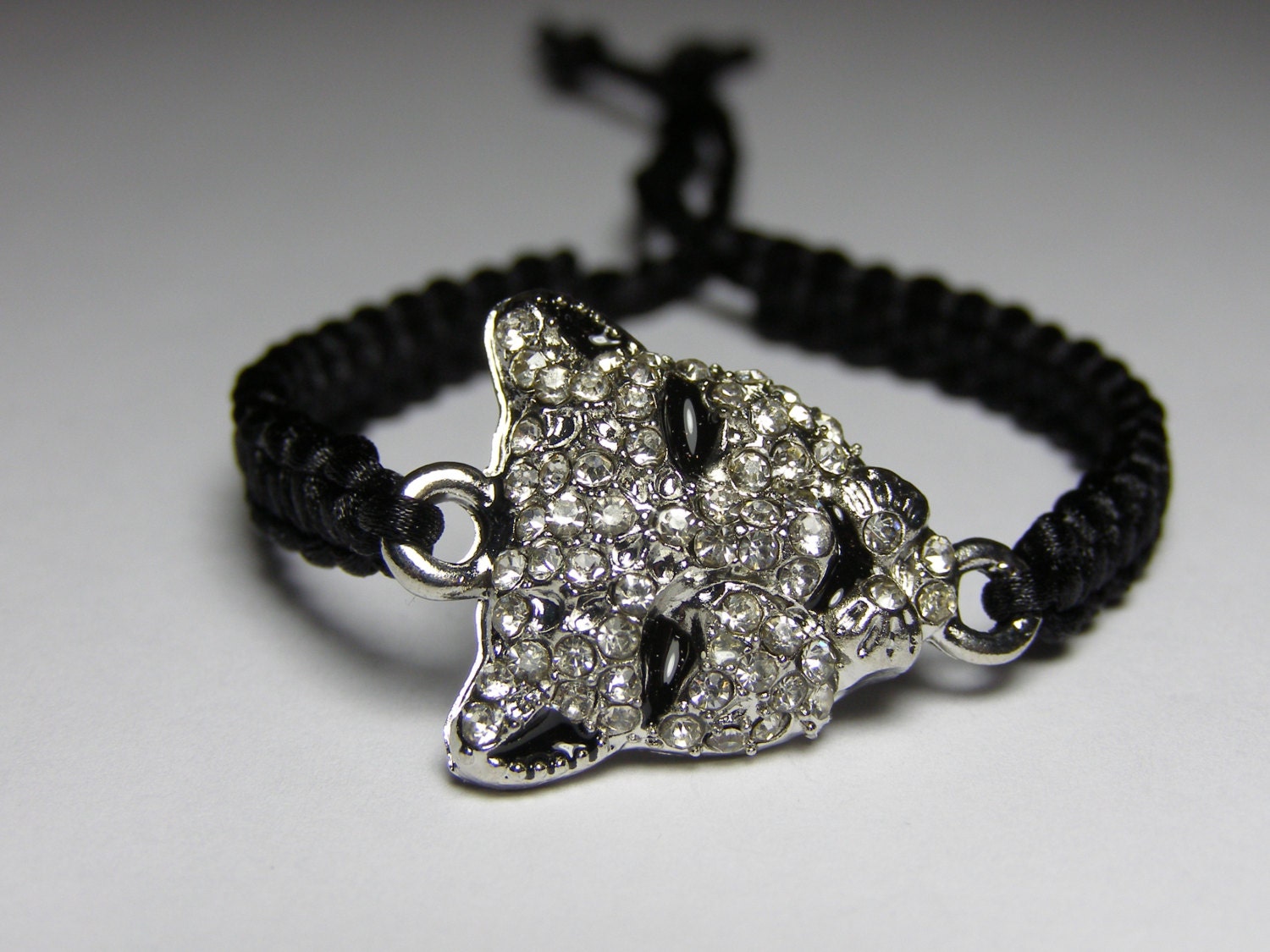 Lion Bracelet with rhinestones and black cord