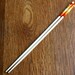 Hand decorated pair of long cooking bamboo chopsticks by Flower Power Nation