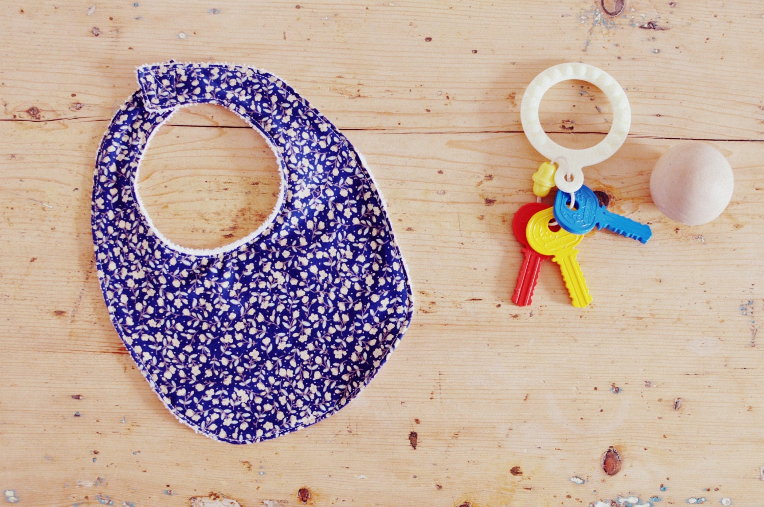Baby bib - ditsy navy floral print with towelling backing
