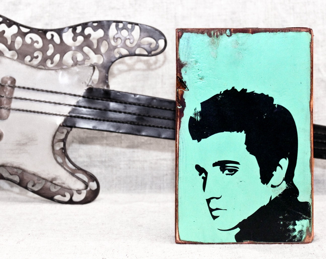Mint green Elvis Presley silhouette art on salvaged wood