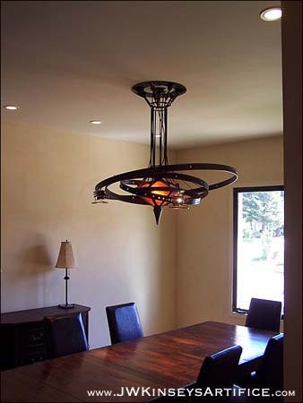 the Orrery Chandelier: a hand-made steampunk styled lamp