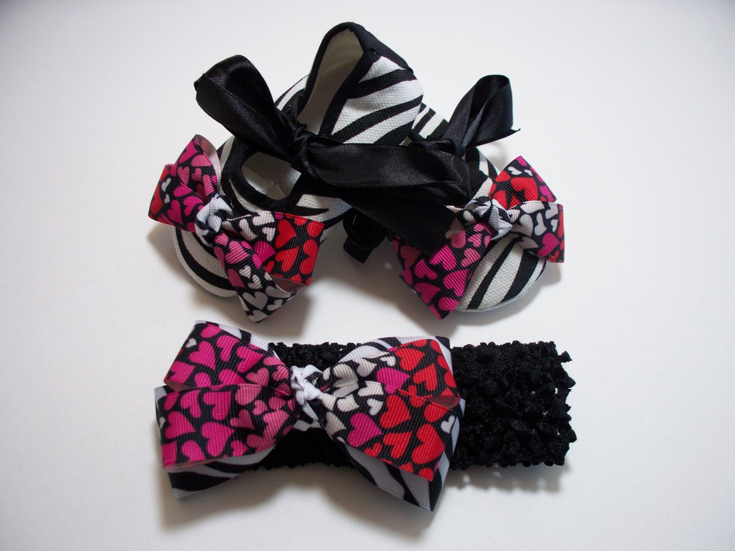 Girls baby shoes, hair bow, and crochet headband set, black and white zebra, with pink, black, and red hearts bow embellishment