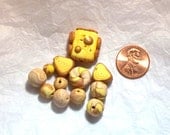 Polymer clay bead set done from handcrafted cane in metallic gold and yellow
