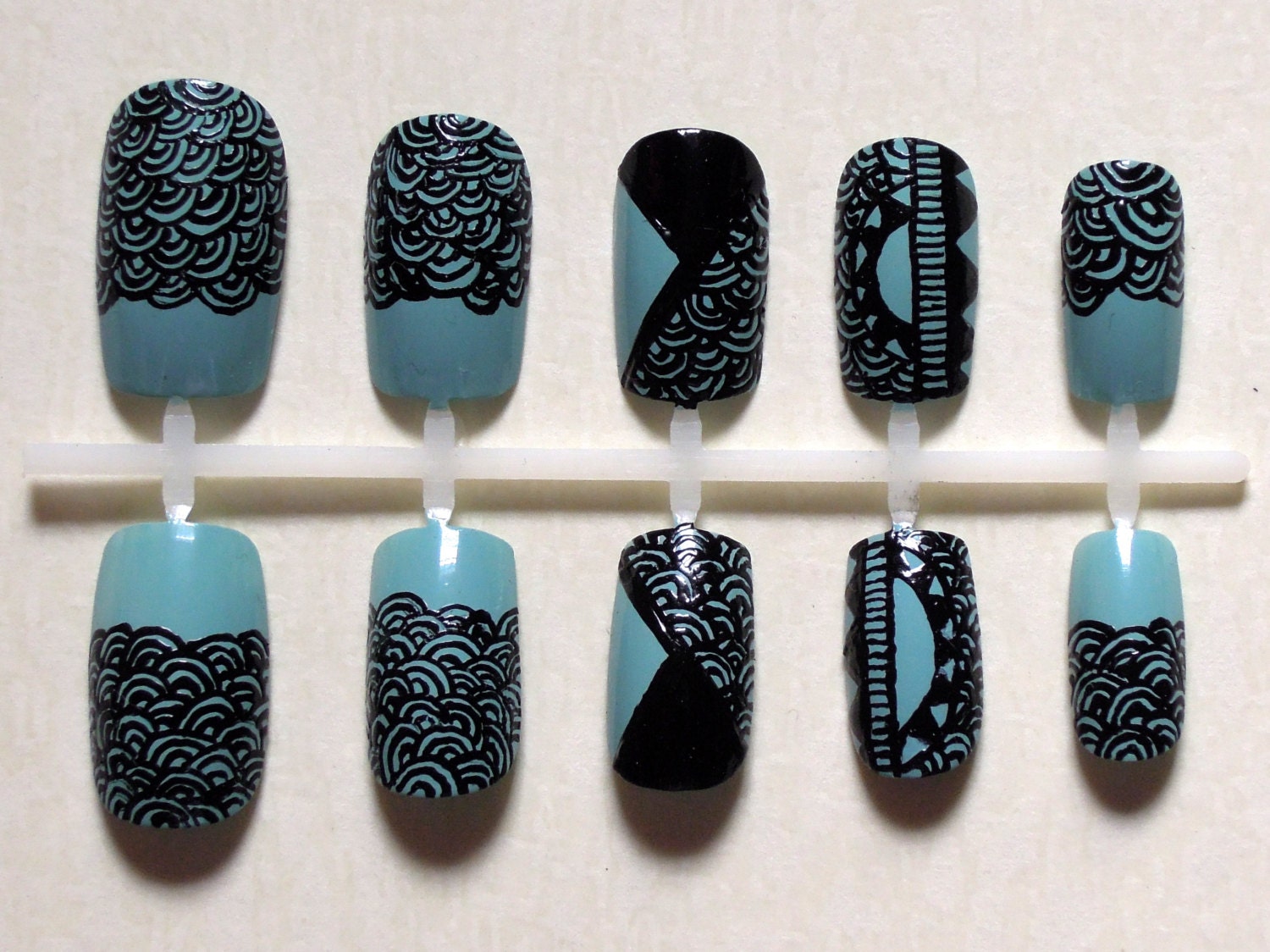 Handpainted Pastel / Baby Blue Fake Nails with Intricate Black Wave Print Detailing Nail Set