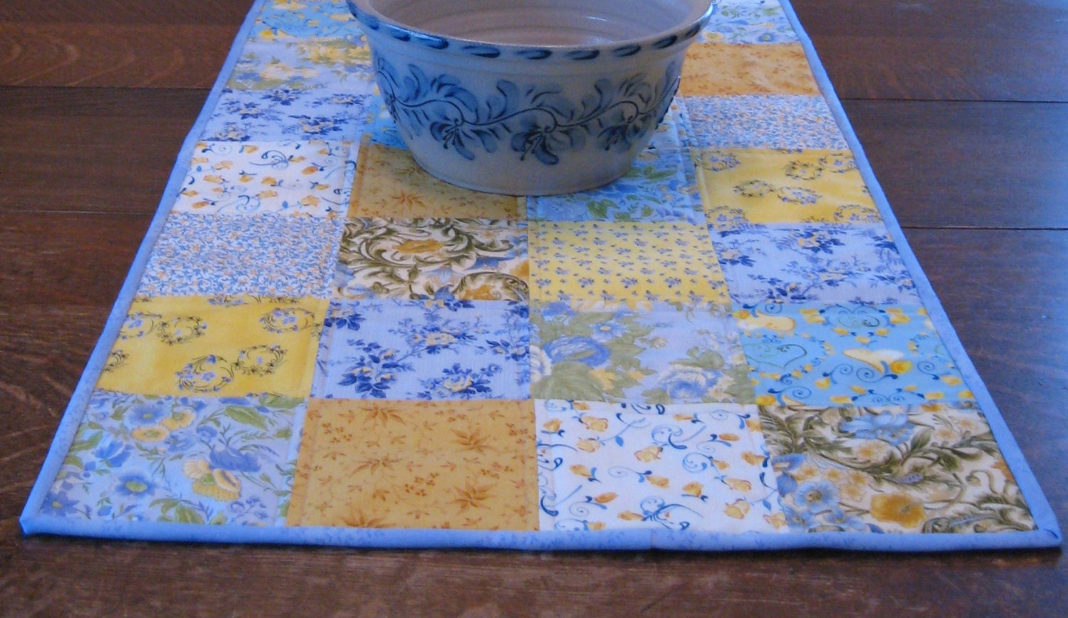 Quilted Table Runner, in blue and yellow varigated floral print fabric