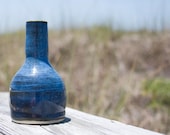 Small blue ceramic vase